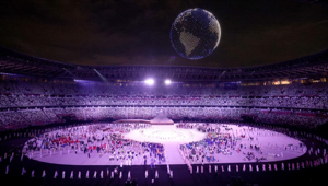 Olimpiadi di Tokyo: fuochi d'artificio, geometrie, una danza di 1800 droni e sport protagonisti dell'opening ceremony. Primo record segnato dalla comunicazione con 3 mld di dollari investiti da 60 aziende
