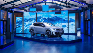 BMW iX3, la "New Era" elettrica parte da Milano: ALL (Uniting Group) firma l'experience internazionale tra città e vette alpine