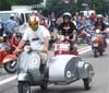 A Roma una parata per il 65° anniversario di Vespa