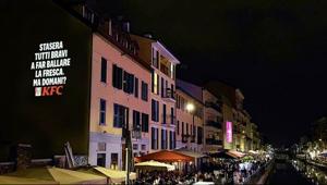 KFC e DUDE proiettano messaggi sui Navigli per far riflettere sul costo della vita a Milano e lanciano il Pollodanaio