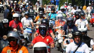 Belfast accoglie la 12esima edizione dei Vespa World Days, il più importante raduno dei Vespa Club di tutto il mondo